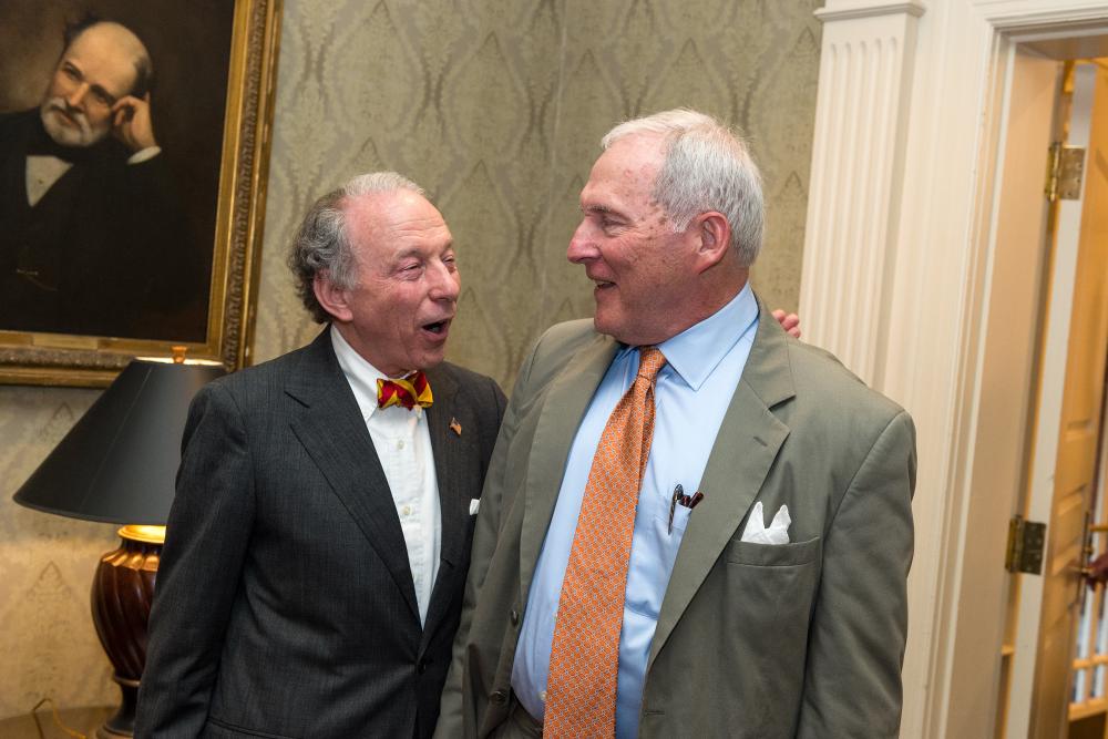 John Ishon greets Charlie Bryan just after Charlie arrived at the surprise reception in his honor. John announced the Dr. Charles F. Bryan Jr. Parkinson’s Research Fund that evening.